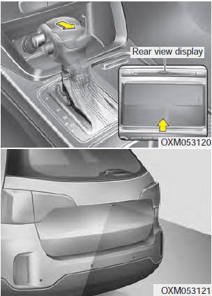 The rearview camera will activate with the ignition switch ON and the shift lever