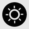 Brightness adjustment menu icon on a Kia Sorento digital mirror display