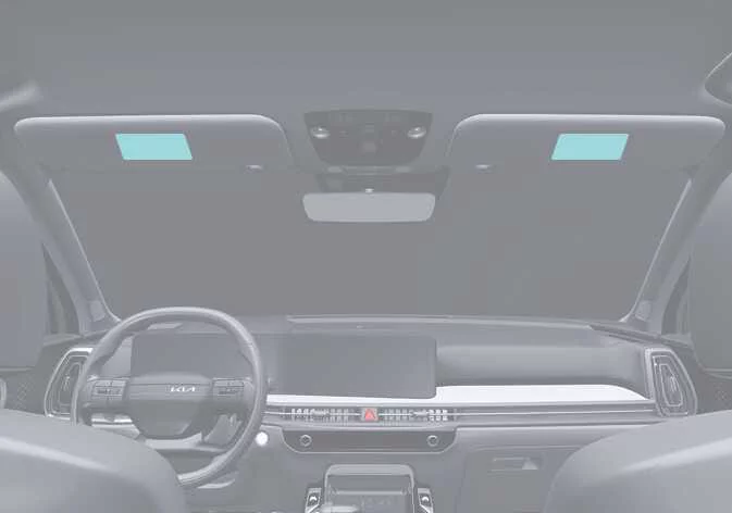 Federal safety warning label affixed to the sun visor of a Kia Sorento regarding airbag precautions