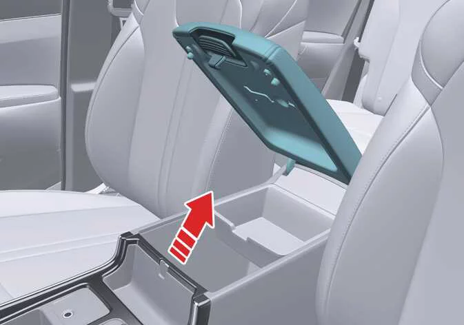 Spacious center console armrest storage compartment open inside the Kia Sorento cabin