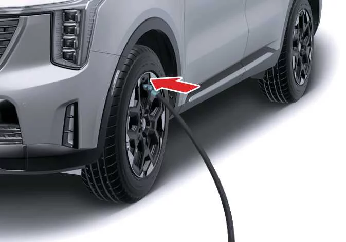 Checking and adjusting tire pressure using the compressor on a Kia Sorento
