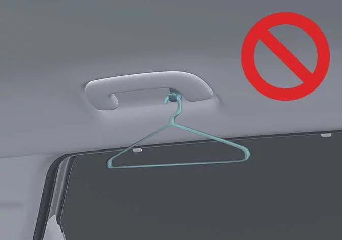 Close-up view of the rear cabin coat hook installation area in the Kia Sorento