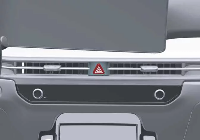 Kia Sorento center dashboard layout showing the location of the hazard lights warning switch