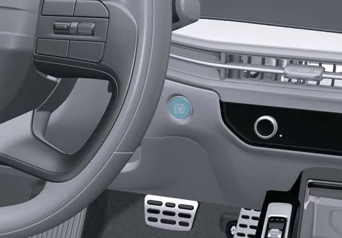 Illuminated push-button ignition switch on the dashboard of the Kia Sorento
