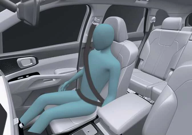 Correct upright seating posture for front passenger in Kia Sorento with seat belt properly fastened