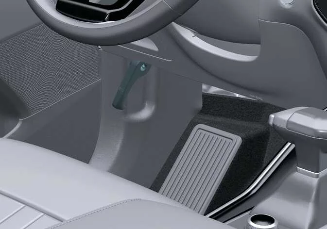 Primary hood release lever location inside the Kia Sorento driver side cabin under dash