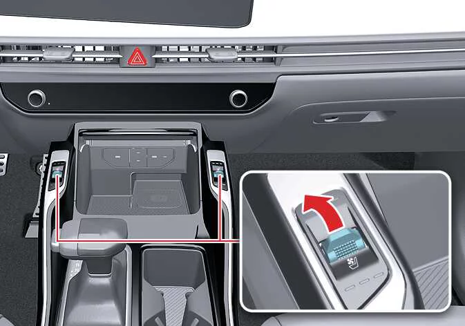 Front seat heater control buttons and ergonomic cushioning in the Kia Sorento