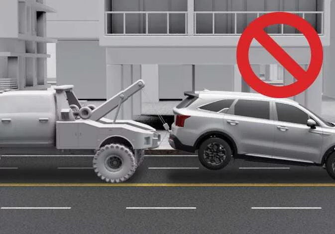 Incorrect rearward towing position for a Kia Sorento 2WD front-wheel-drive vehicle