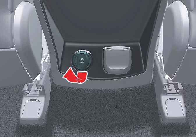 Plugging the compressor power cable into the Kia Sorento accessory power outlet