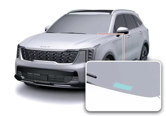 Kia Sorento dashboard VIN plate visible through the front windshield glass