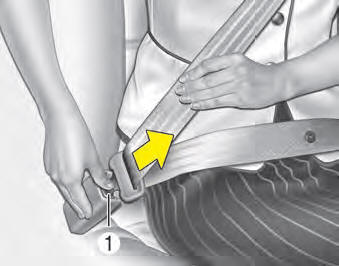 The seat belt is released by pressing the release button (1) on the locking buckle.